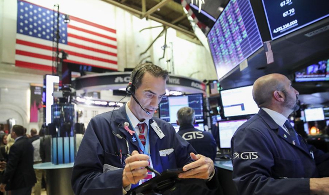 U.S. stocks rise after Fed cuts rates