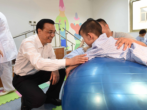 這三年，總理牽掛的殘疾人群體，迎來(lái)哪些暖政？