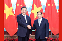 習(xí)近平會見越南總理范明政