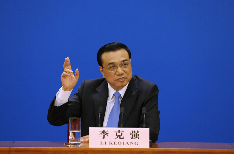 3月15日，國務(wù)院總理李克強在北京人民大會堂與中外記者見面，并回答記者提問。 新華社記者 沈伯韓 攝