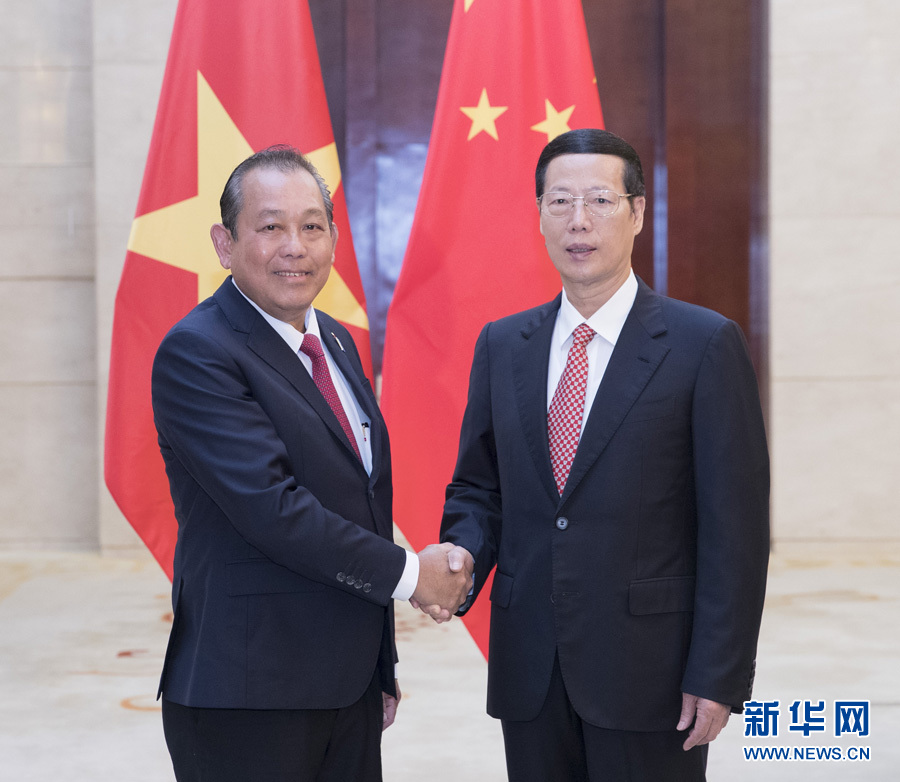  9月11日，中共中央政治局常委、國務院副總理張高麗在廣西南寧會見前來出席第十四屆中國－東盟博覽會和中國－東盟商務與投資峰會的越南常務副總理張和平。新華社記者王曄攝