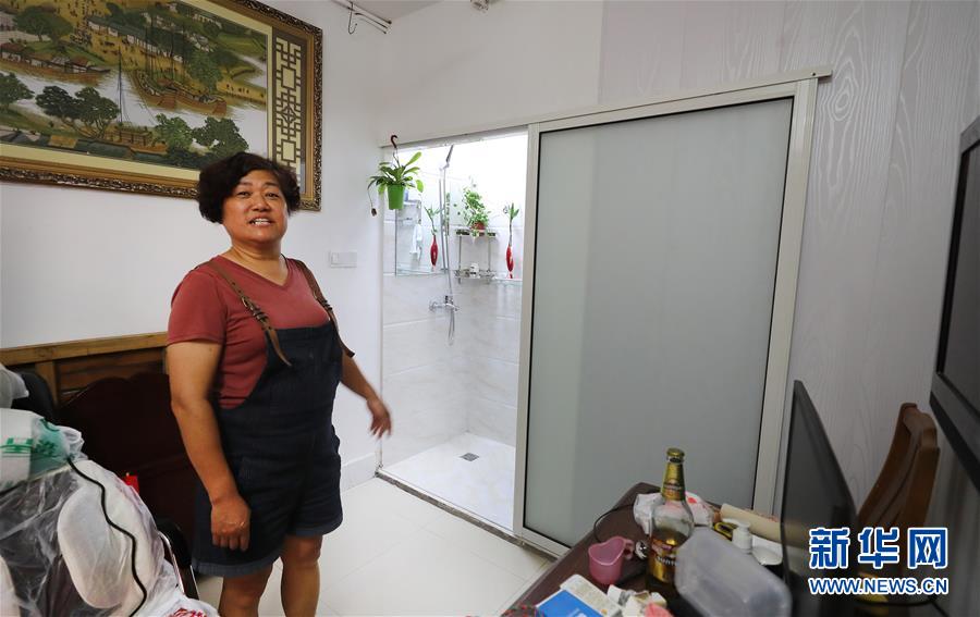 (新華全媒頭條·圖文互動(dòng))(8)上海:“三只桶”里看變化