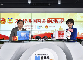 李明做客新華網(wǎng)兩會(huì)訪(fǎng)談