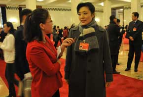 全國政協(xié)委員周濤接受本網記者采訪