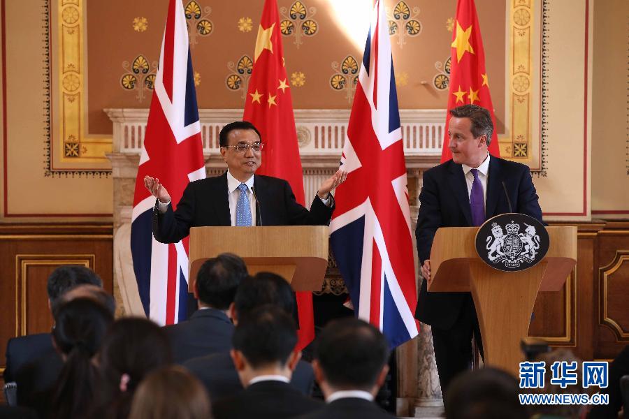 6月17日，國務院總理李克強同英國首相卡梅倫在倫敦舉行中英總理年度會晤后共同會見記者。新華社記者 龐興雷 攝