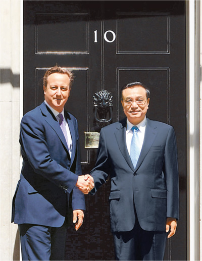 6月17日，國(guó)務(wù)院總理李克強(qiáng)在倫敦唐寧街10號(hào)首相府同英國(guó)首相卡梅倫舉行中英總理年度會(huì)晤。新華社記者 李 濤攝 