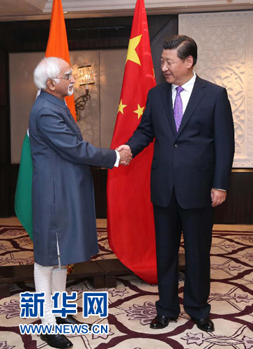 9月18日，國家主席習(xí)近平在新德里會見印度副總統(tǒng)兼聯(lián)邦院議長安薩里。 新華社記者 龐興雷 攝