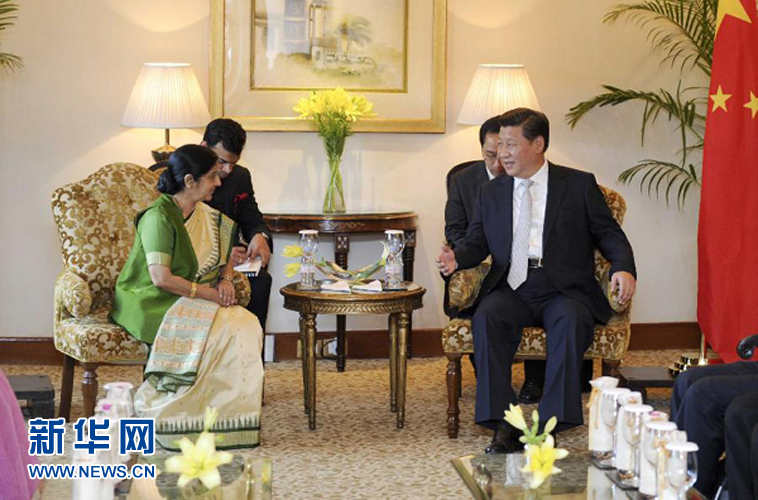9月18日，國家主席習(xí)近平在新德里會見印度外長斯瓦拉杰。新華社記者 張鐸 攝