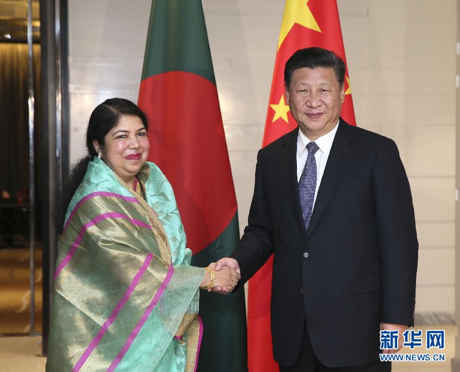 10月14日，國家主席習(xí)近平在達(dá)卡會見孟加拉國國民議會議長喬杜里。 新華社記者蘭紅光攝 