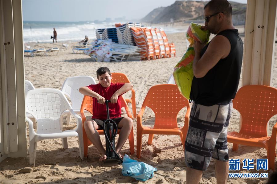 （國(guó)際&middot;圖文互動(dòng)）（3）特寫：穿過檢查站去看海